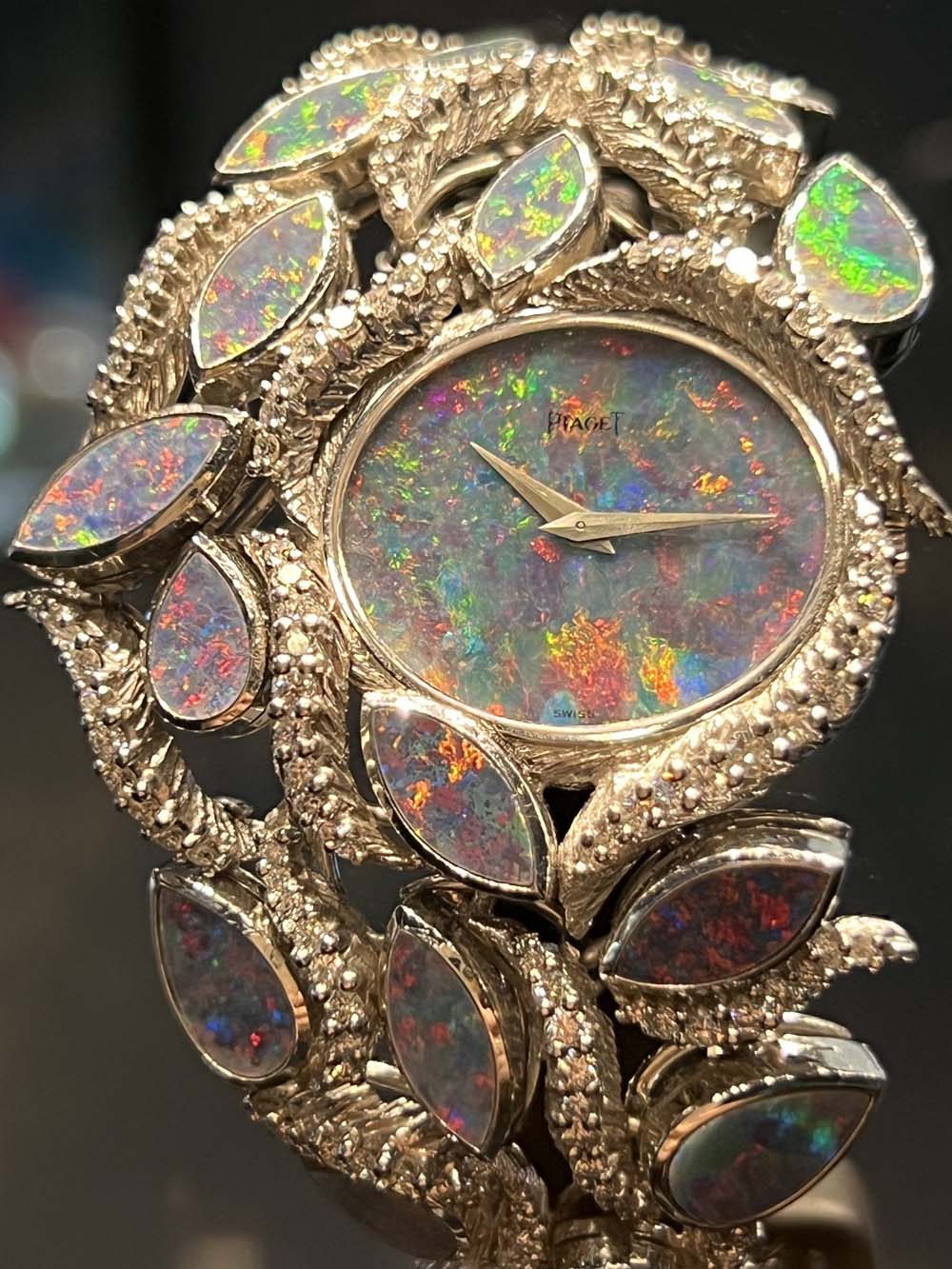 Rare vintage Piaget high jewelry watch with opal dial and diamond-set gold leaf bracelet — fine jewelry appraisal and wealth advisory